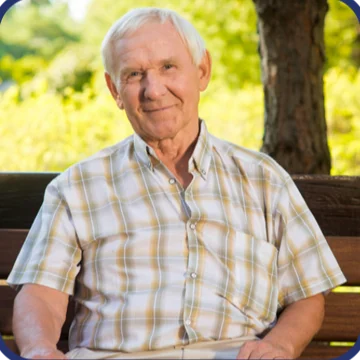Older man sitting outdoors used to represent a TitanFlow customer testimonial